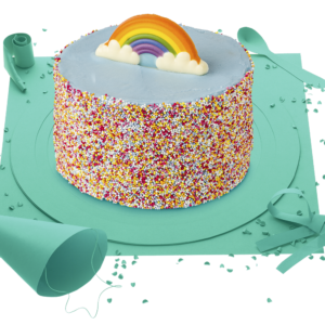 [Visuel du gâteau Arc-En-Ciel, gâteau bleu entouré de vermicelles multicolores]